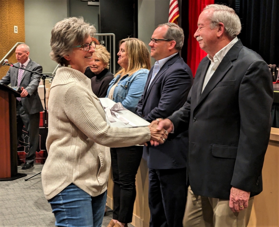 retiree shaking hands with Board President Rich Haffey